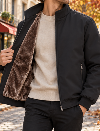 Bomber uomo nero con collo alto, interno effetto pelliccia e fondo a coste