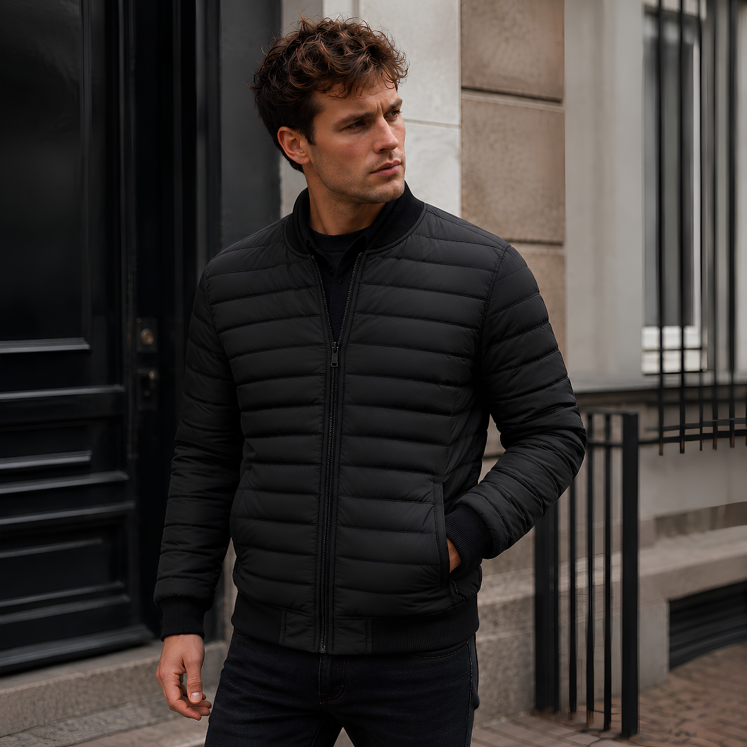 Bomber uomo nero trapuntato con righe imbottite e zip centrale