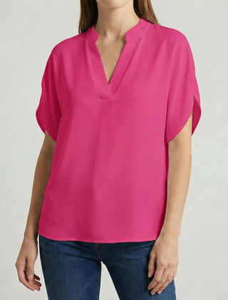 Camicetta fucsia donna con scollo a V, linea oversize e orlo curvo