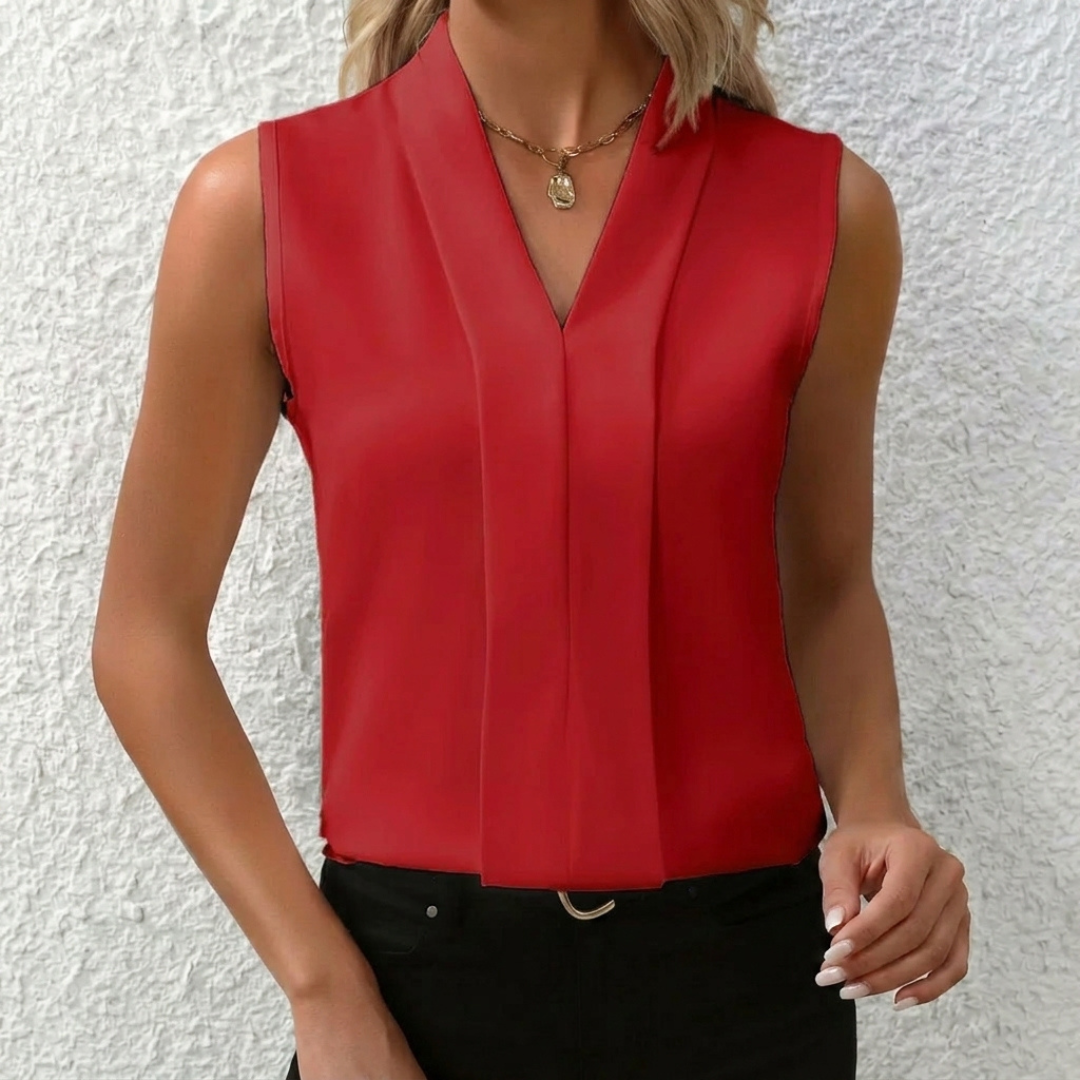 Camicetta rossa senza maniche con scollo a V e piega centrale sul davanti