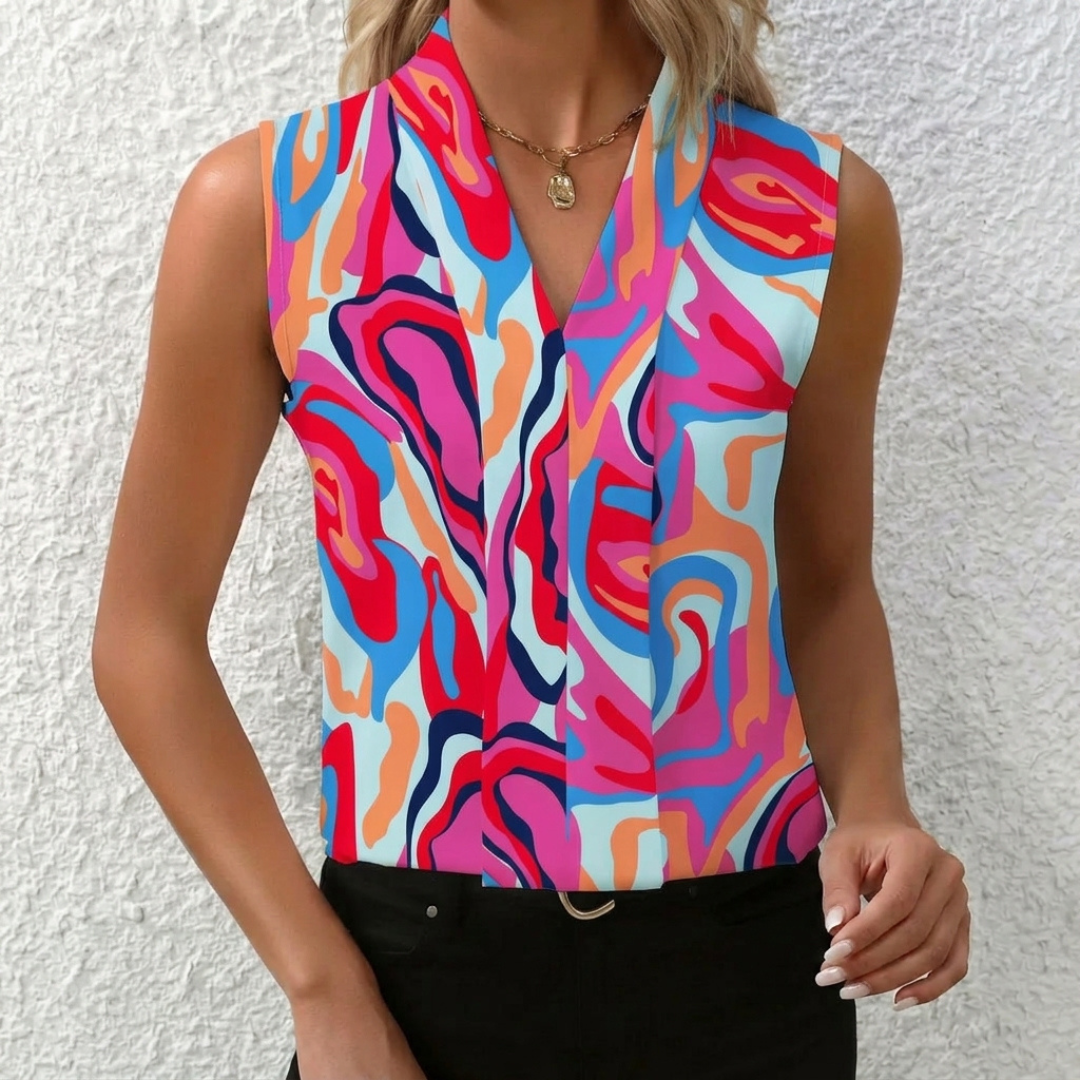 Camicetta multicolore smanicata con fantasia astratta rosa, blu e arancione