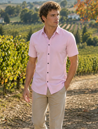 Camicia uomo rosa a maniche corte in tinta unita con abbottonatura a vista