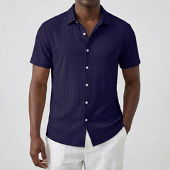 Camicia uomo maniche corte blu navy con bottoni bianchi e colletto classico