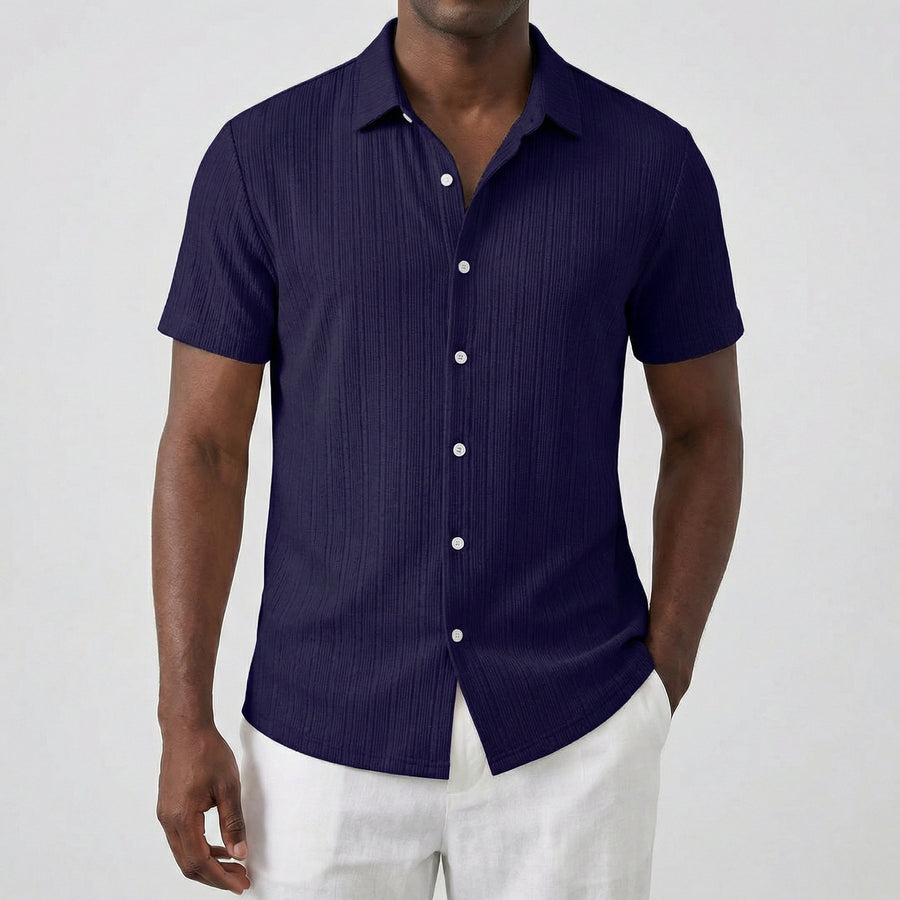 Camicia uomo maniche corte blu navy con bottoni bianchi e colletto classico