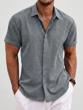 Camicia uomo grigia a maniche corte, colletto aperto e trama fitta appena visibile