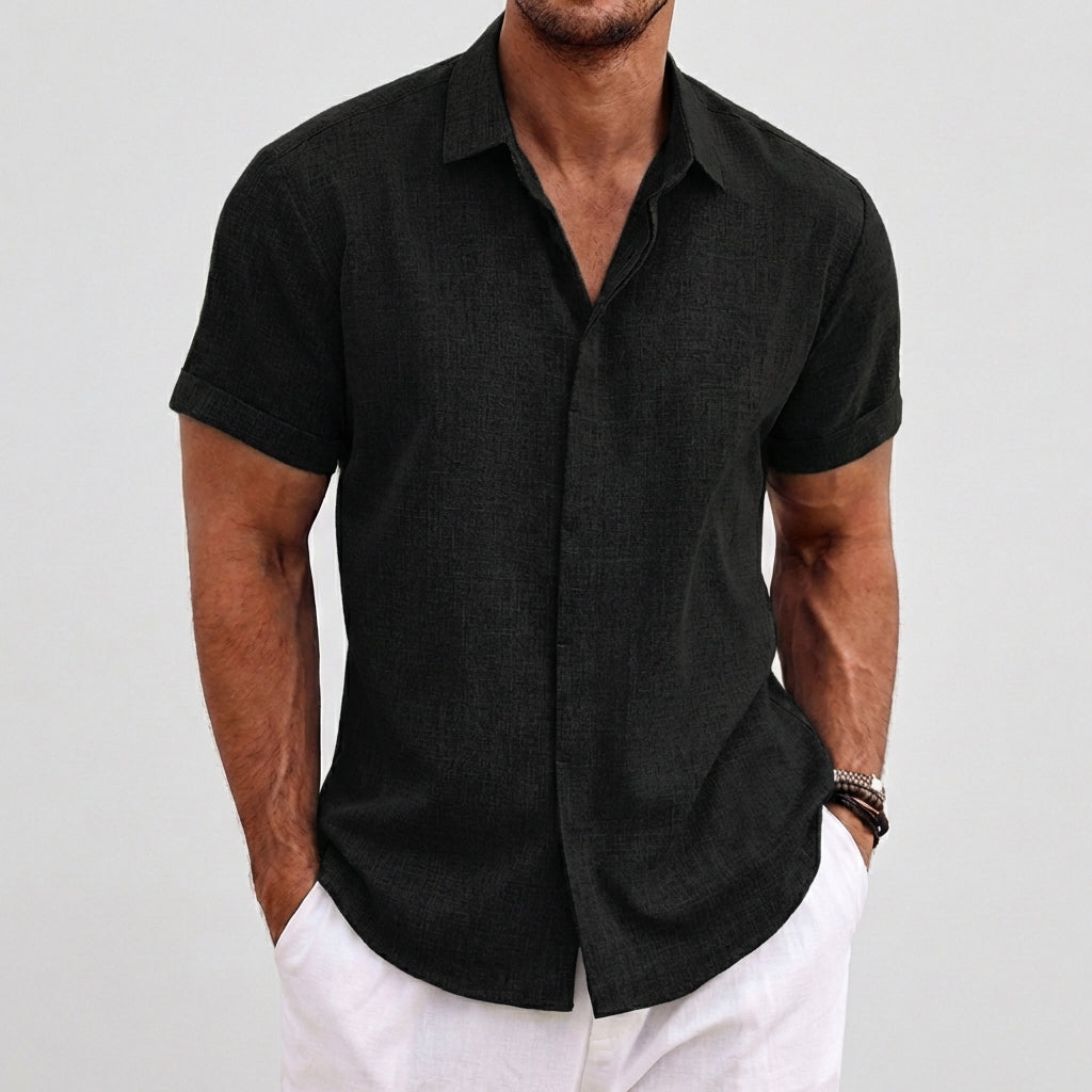 Camicia uomo nera maniche corte con abbottonatura frontale e orlo arrotondato