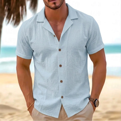 Camicia uomo azzurra a maniche corte con colletto a revers aperto sul davanti