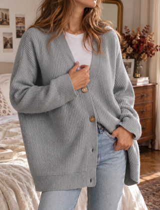 Cardigan donna grigio in maglia a coste con maniche lunghe e fondo a costine
