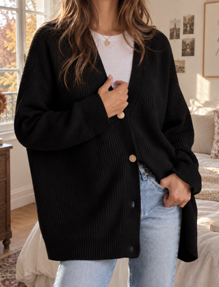 Cardigan donna nero a coste con scollo a V e polsini a costine