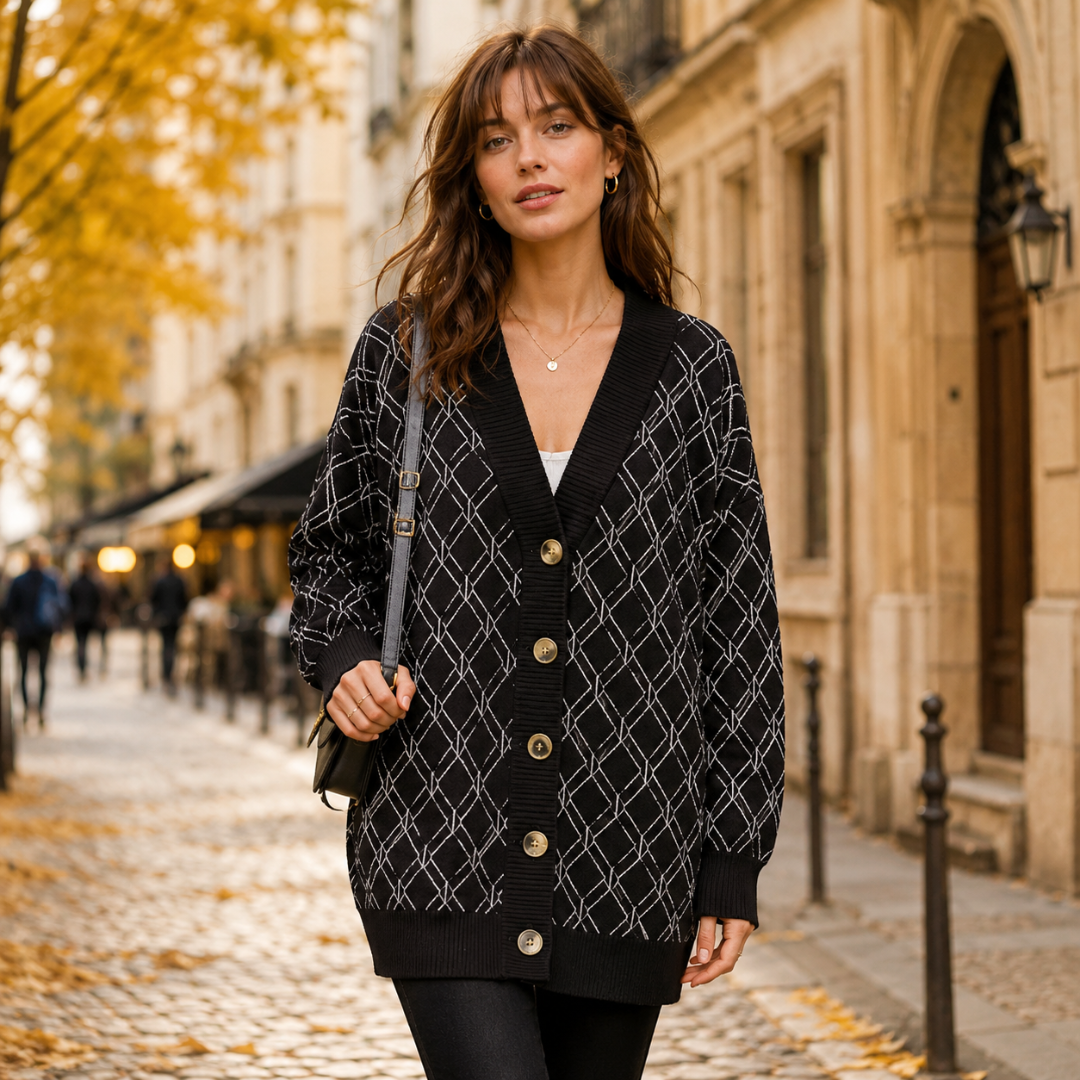 Cardigan nero con motivo a rombi bianchi, bottoni sul davanti e maniche lunghe