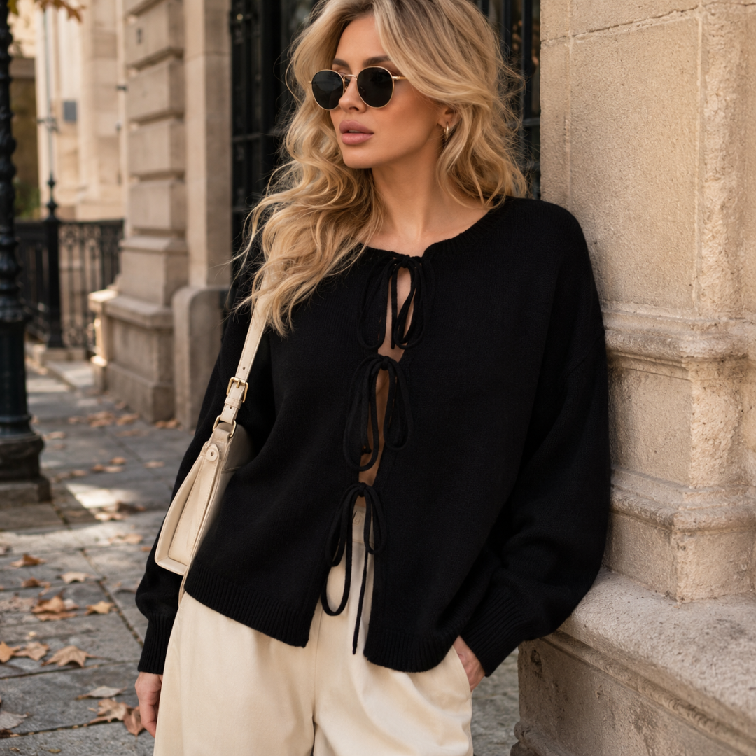 Cardigan donna nero con chiusura a fiocchi, girocollo e orlo a coste