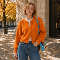 Cardigan donna arancione corto in maglia con zip centrale e girocollo a coste