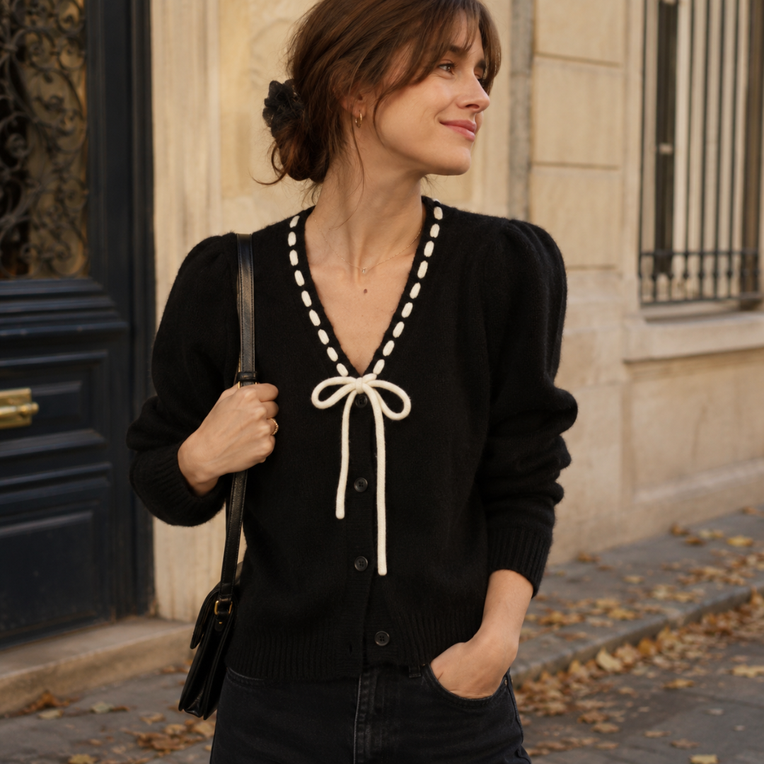 Cardigan donna nero con punto a contrasto crema e fiocco annodato