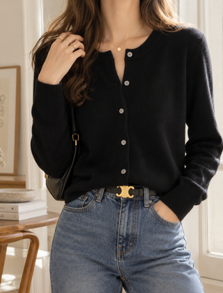 Cardigan donna nero a girocollo con bottoni frontali e fondo a costine