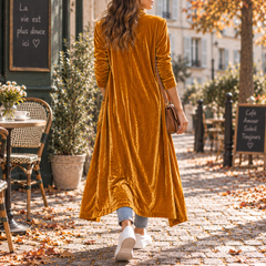 Retro del cardigan lungo arancione con linea ampia che sfiora la caviglia