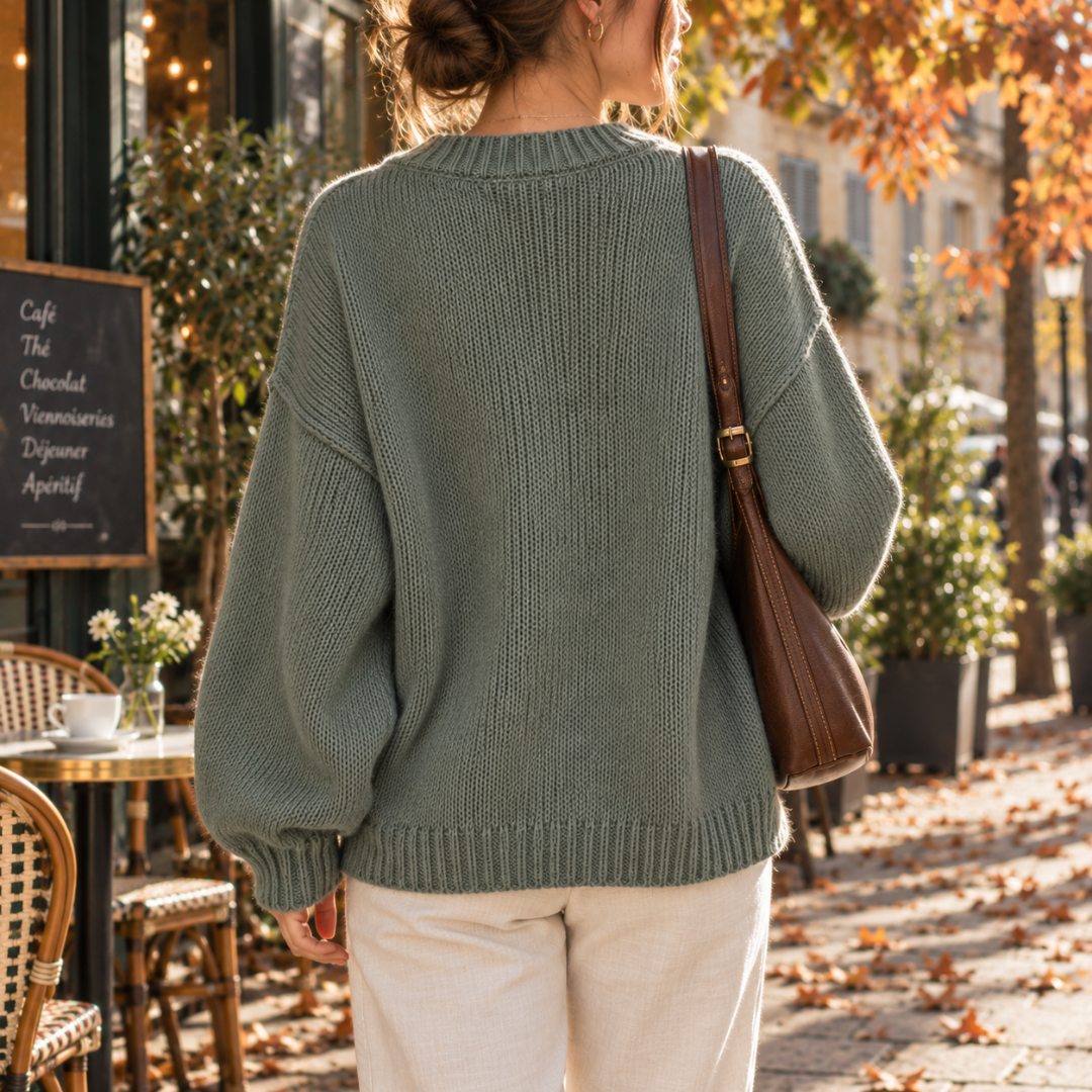 Retro del cardigan verde in maglia grossa con bordo inferiore a coste