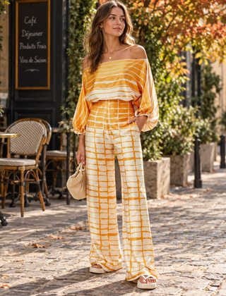 Completo arancione a righe con top ampio e pantaloni fantasia a gamba larga