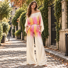 Completo donna rosa con top a spalle scoperte e pantaloni a gamba larga