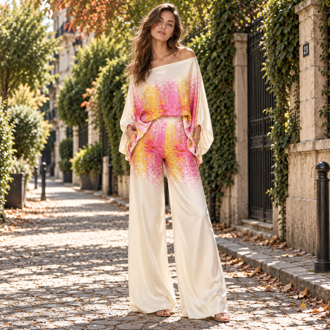 Completo donna rosa con top a spalle scoperte e pantaloni a gamba larga
