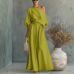 Completo donna verde chiaro con spalla scoperta e pantaloni ampi con tasche laterali