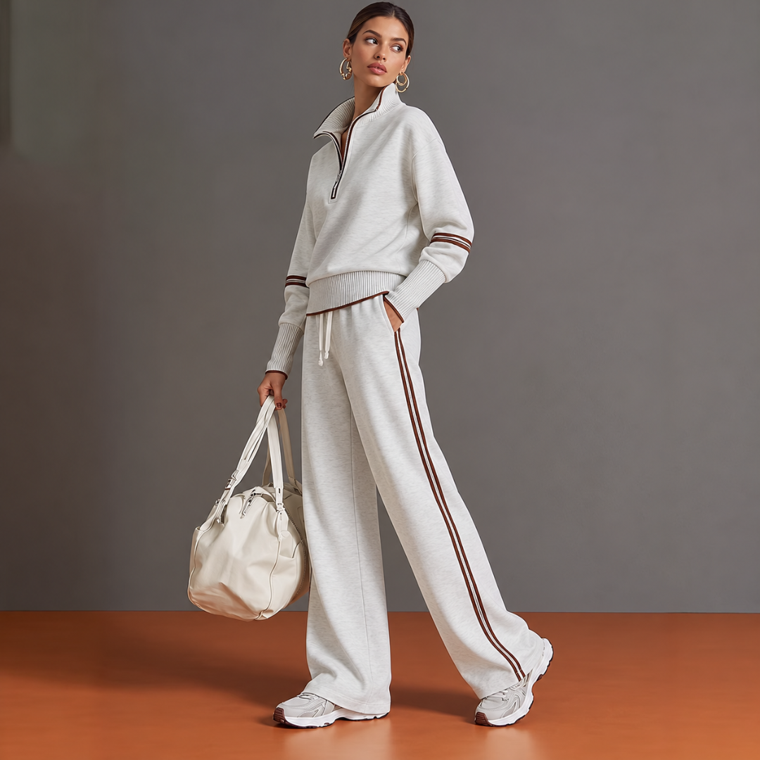Completo bianco donna con collo alto, zip e coulisse in vita