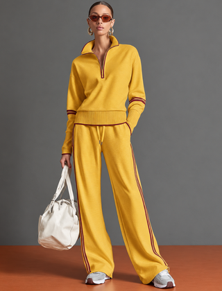 Completo donna giallo con mezza zip e pantaloni larghi a righe laterali