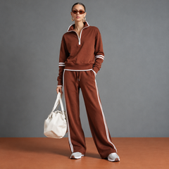 Completo donna marrone con collo alto zippato e pantaloni a gamba larga
