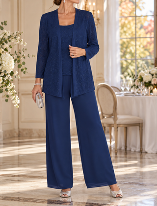 Completo blu navy tre pezzi con giacca luminosa e pantaloni a gamba larga