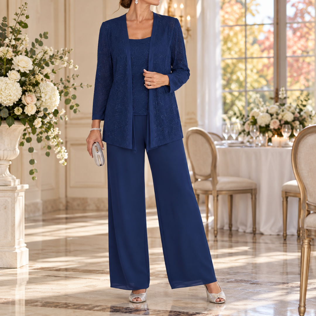 Completo blu navy tre pezzi con giacca luminosa e pantaloni a gamba larga