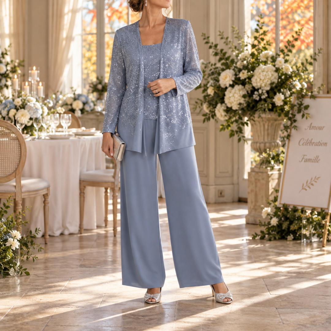 Completo celeste tre pezzi con giacca luminosa e pantaloni a gamba larga