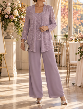 Completo lilla con giacca a paillettes e pantaloni fluidi a gamba larga