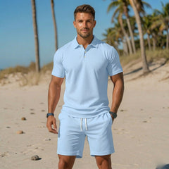 Completo uomo celeste con polo abbottonata e shorts con cordoncino bianco