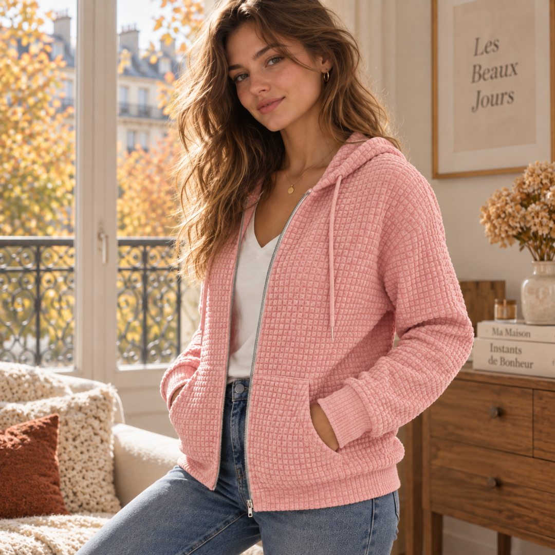 Felpa rosa con cappuccio e coulisse, vista di tre quarti con zip aperta