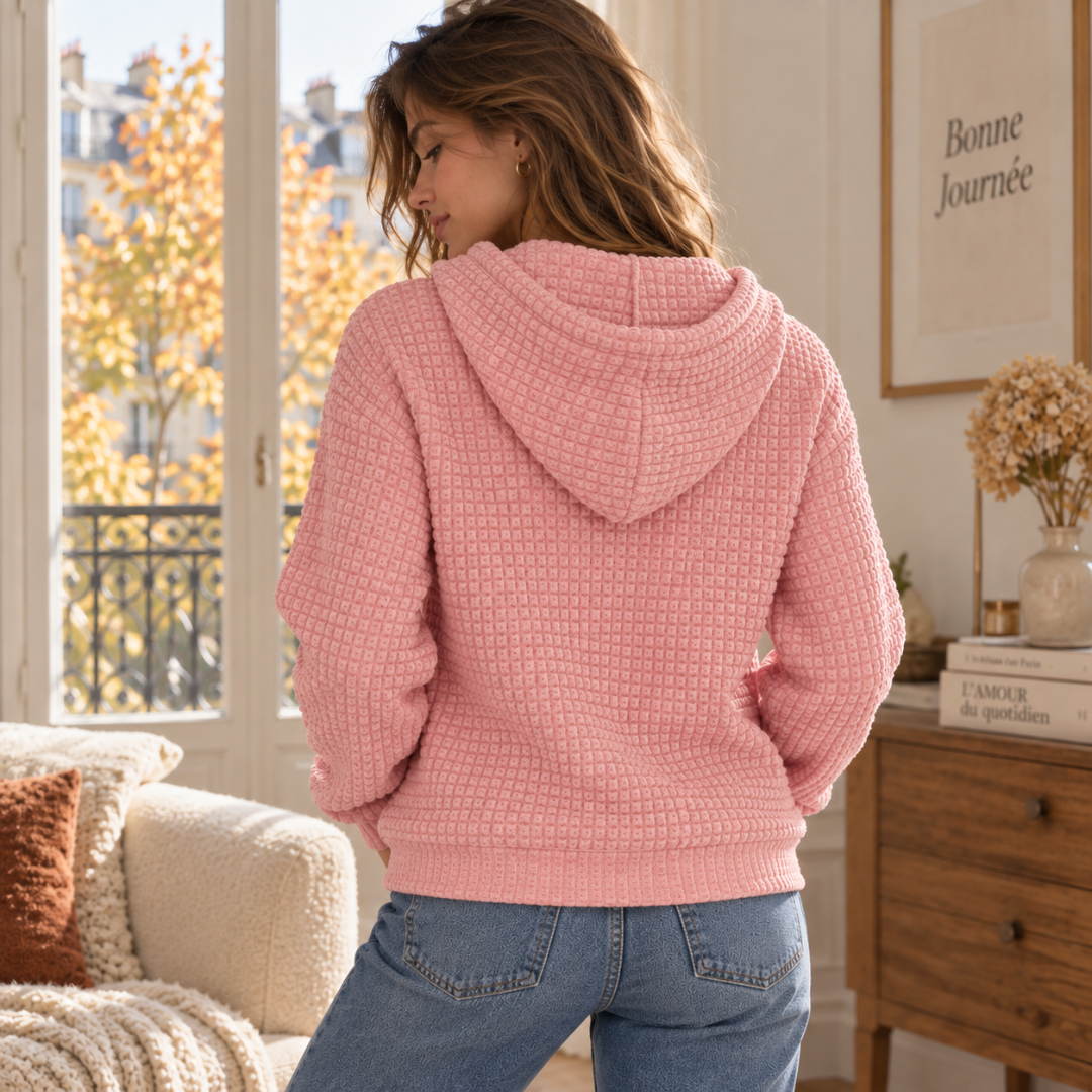 Retro della felpa rosa con cappuccio, texture a quadretti e fondo a costine