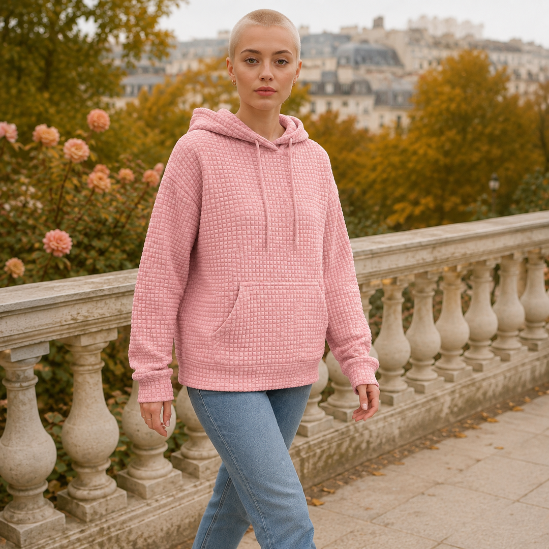 Felpa rosa con cappuccio in movimento, tasca frontale e coulisse ben visibili