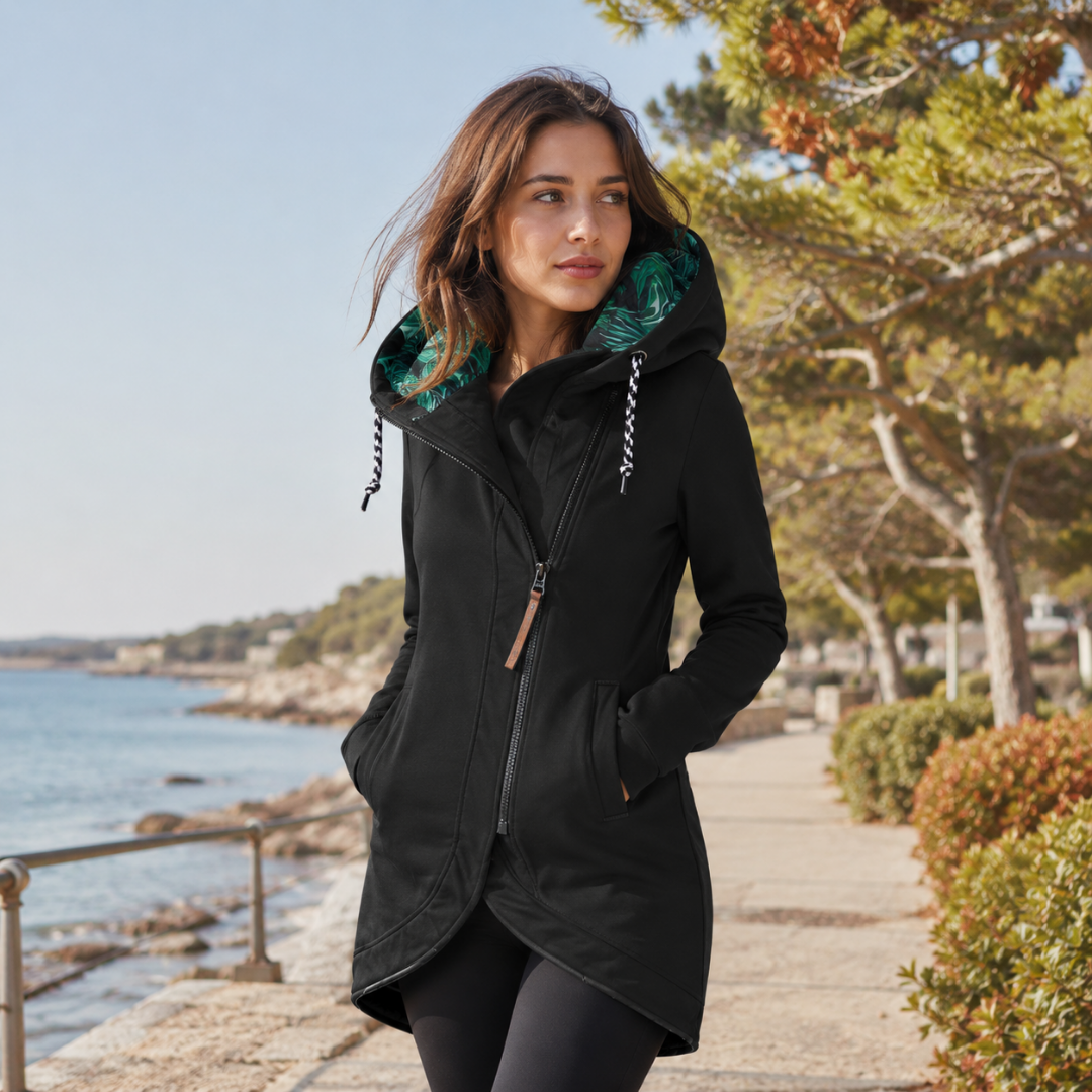Giacca donna nera lunga con cappuccio, coulisse a contrasto e zip laterale