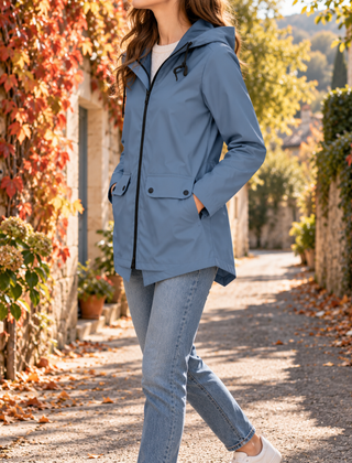 Giacca donna azzurra con cappuccio a coulisse e zip nera a contrasto