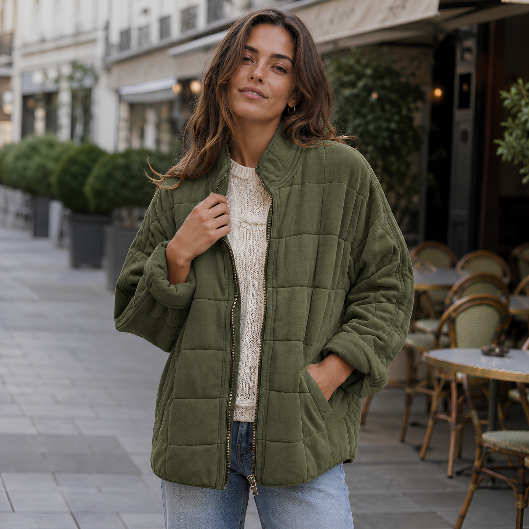 Giacca trapuntata verde militare con collo alto e tasche laterali inserite