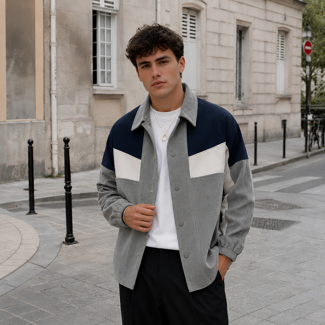 Giacca uomo grigia color block con inserti blu navy e bianchi sul petto