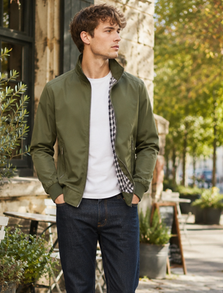 Giacca Harrington uomo verde con zip centrale e tasche laterali con zip