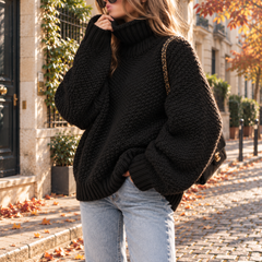 Maglione donna nero a collo alto in maglia grossa con bordo a costine