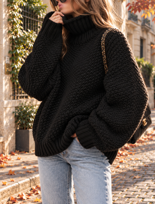 Maglione donna nero a collo alto in maglia grossa con bordo a costine