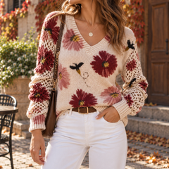 Maglione donna con fiori rossi lavorati a maglia e bordo inferiore a coste
