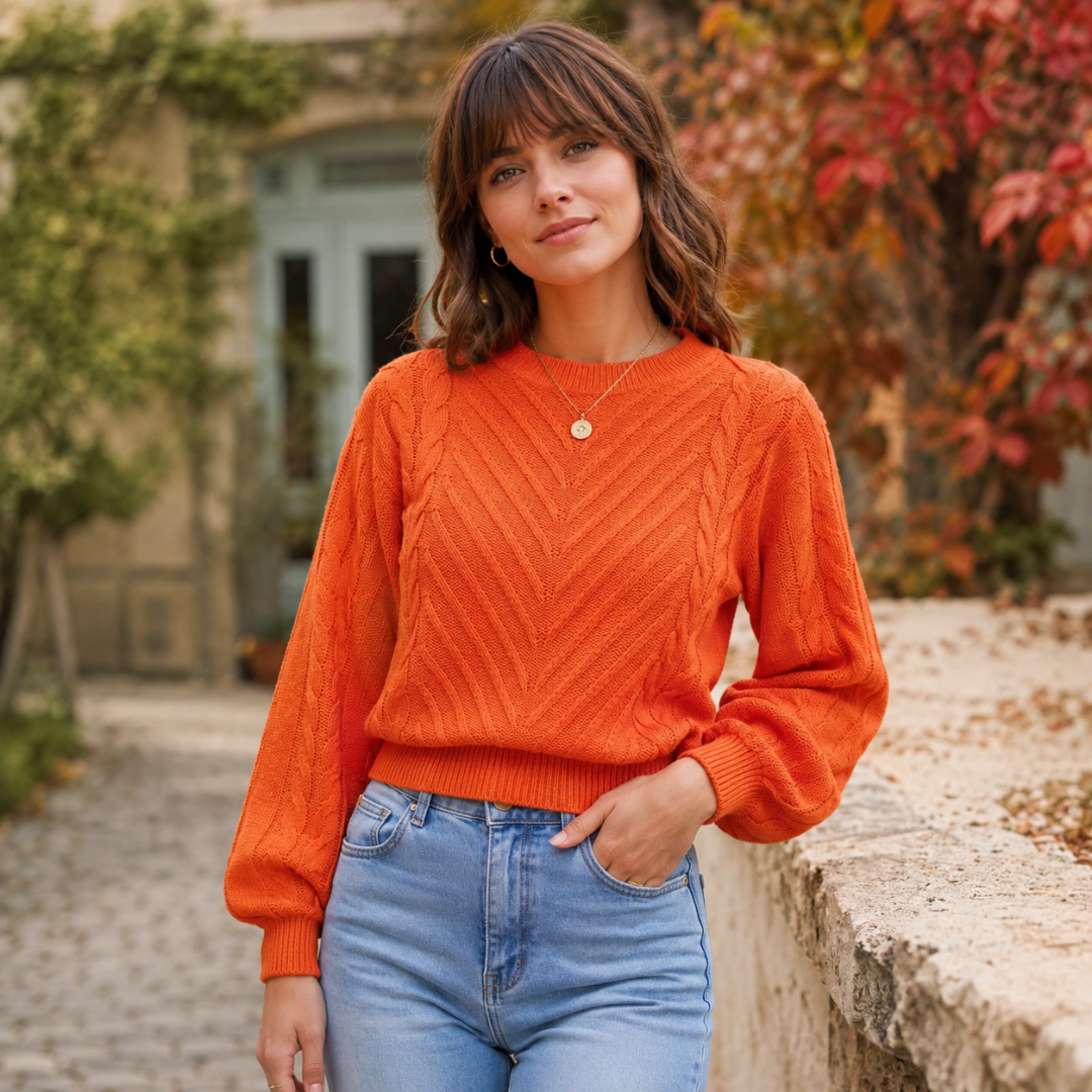 Maglione donna arancione intrecciato con girocollo a coste e polsini stretti