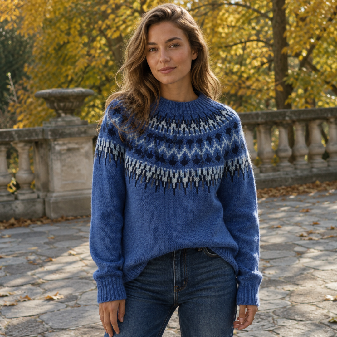 Maglione blu con jacquard nordico bianco sullo sprone e maniche lunghe