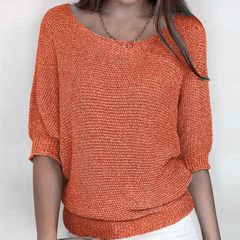 Maglione donna arancione con maniche a pipistrello e polsini lavorati a coste