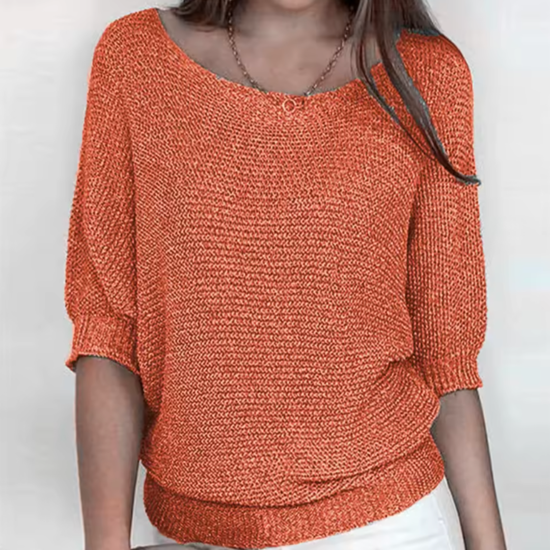 Maglione donna arancione con maniche a pipistrello e polsini lavorati a coste