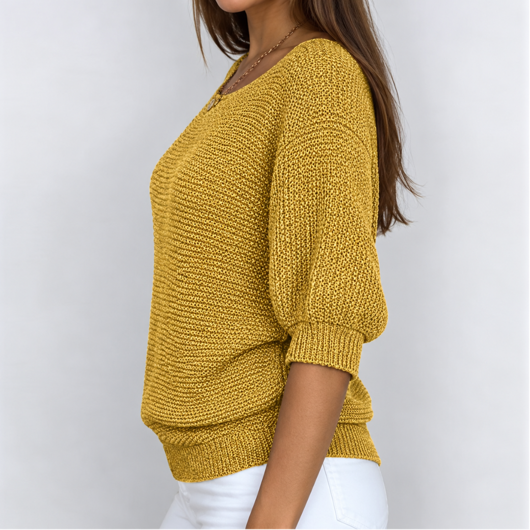 Maglione donna giallo senape di profilo con fascia inferiore a coste larga
