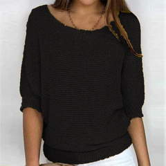 Maglione donna nero in maglia a trama larga con polsini e bordo a coste