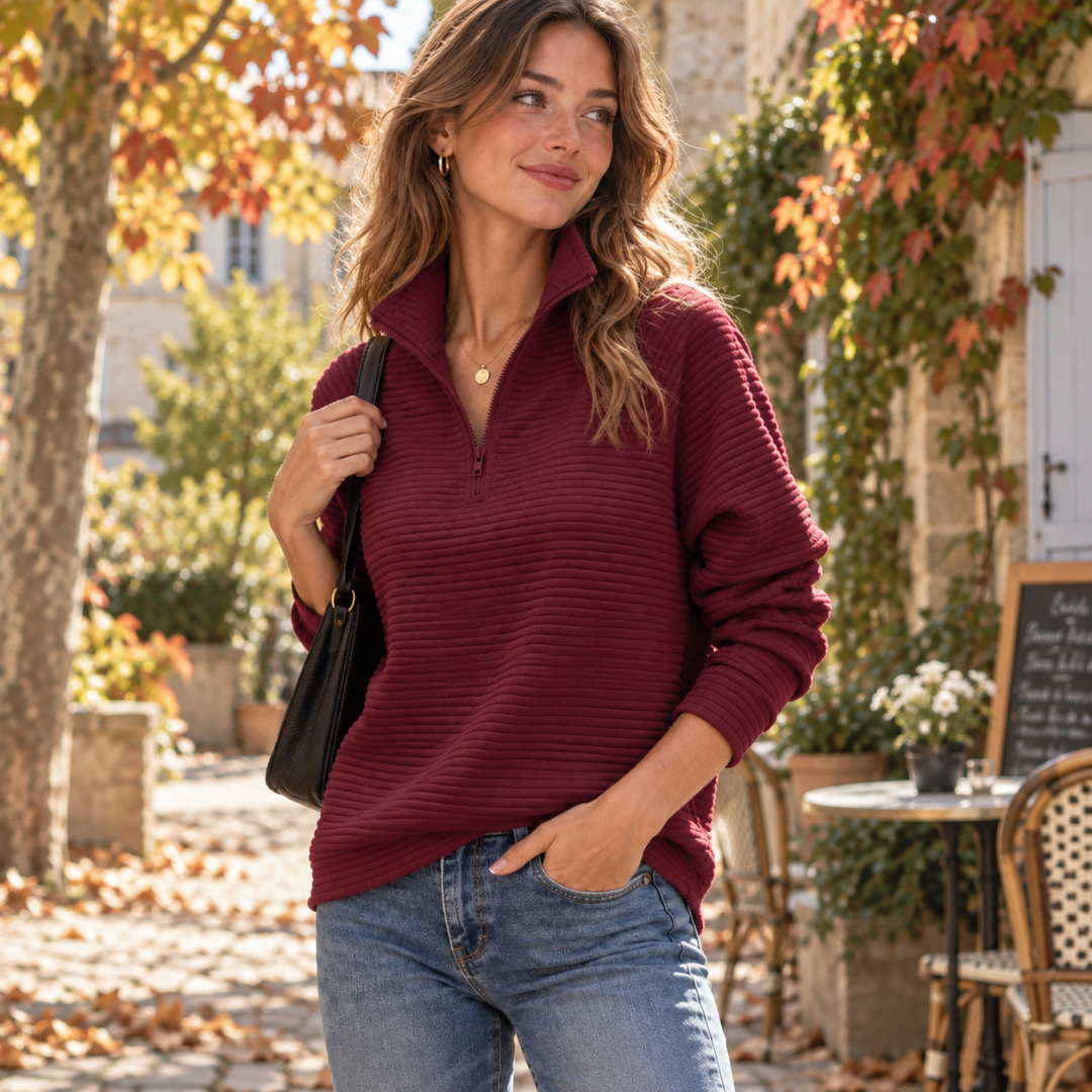 Maglione rosso a coste con zip centrale aperta e maniche lunghe